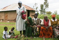 Kenyan women gather with children